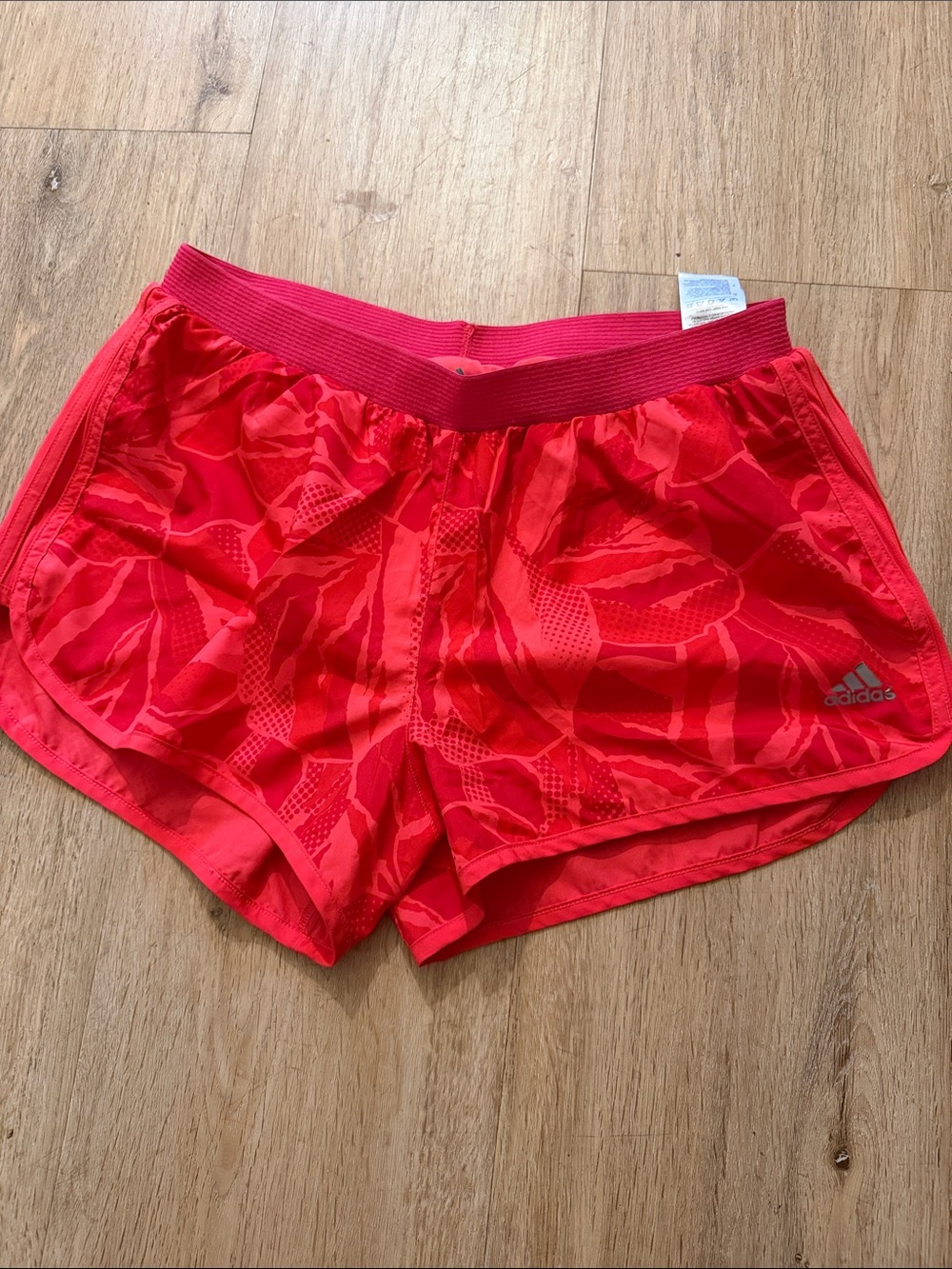 adidas Women’s Red Athletic Running Shorts with Subtle Pattern